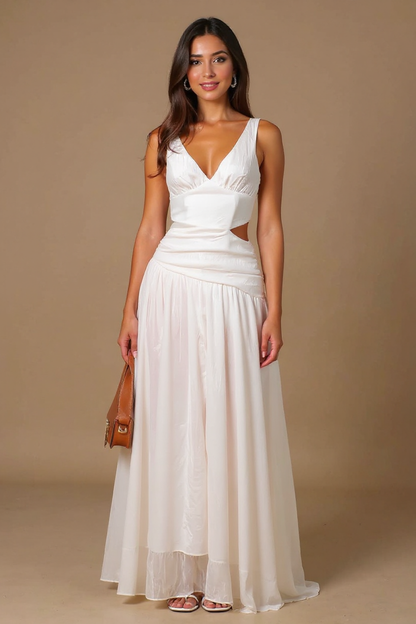 Woman wearing a white dress with cut-out design on a beige background
