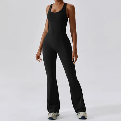 Person wearing a black jumpsuit on a white background